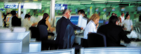 Investors at computers trading