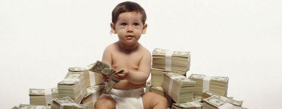 Baby sitting on pile of cash