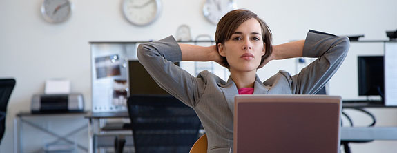 Woman budgeting on laptop
